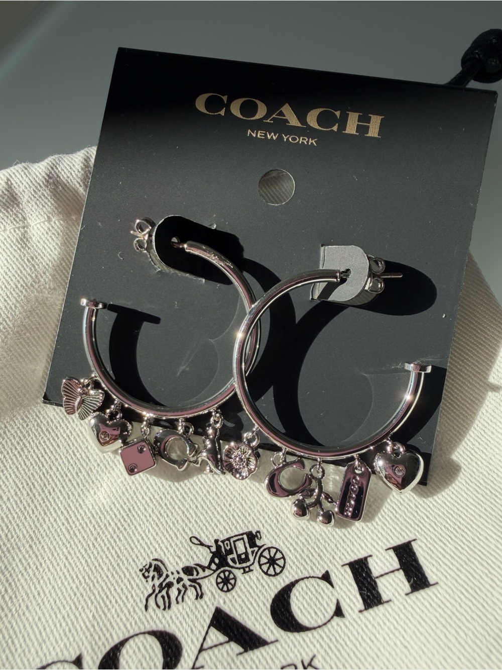 Coach silver mini icon charm hoop earrings